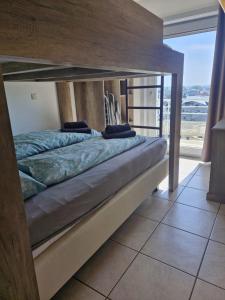 Appartement met zeezicht, zwembad & garage