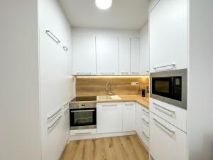 Simcity VIII l City center & garage parking 24 7 self check-in