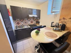 Appartements T2 Ambiance Savane - hyper centre : photos des chambres