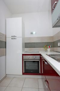 Apartments by the sea Banjol, Rab - 12838