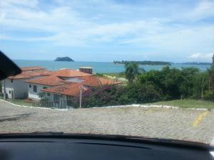 Casa a 20 metros da praia, Wi-Fi em condomínio privado!