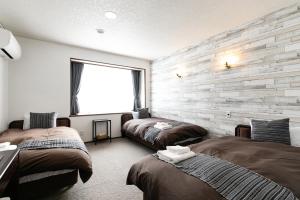 White Tree Lodge Madarao Tangram