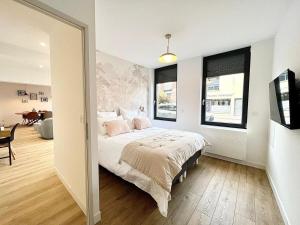 Appartements Le Design proche de la mer : photos des chambres