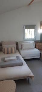 Appartements La Ginente Appartement : photos des chambres