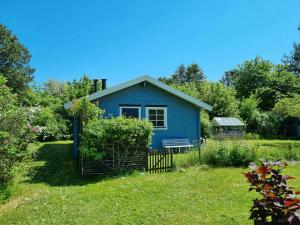 Blue Cottage On Idyllic Askø