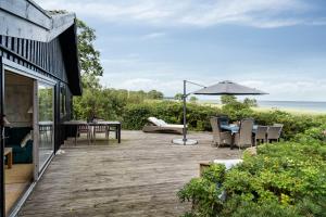 Beach House With Wild Roses And Sunbeams