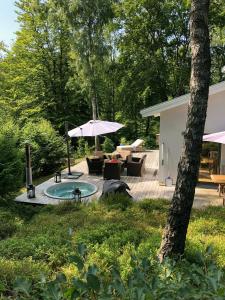 Modern Stone House With Hot Tub In Åsljunga Forest