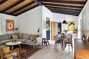 Unique Beach Cabin With Wooden Ceilings