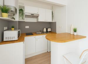 Appartements Lumineux et Rayonnant appartement : photos des chambres