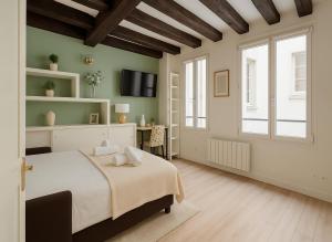 Appartements Lumineux et Rayonnant appartement : photos des chambres
