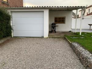 Maison lumineuse avec jardin & parking clos