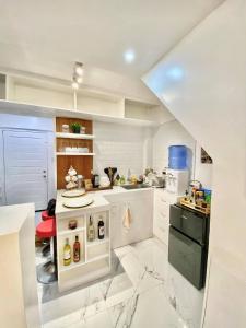 Budget Loft-type condo in Uptown CDO