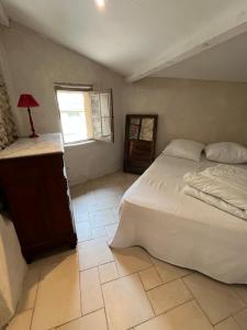 Maisons de vacances Charmante maison de village avec terrasse : photos des chambres