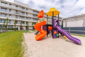 Apartamenty Ku Morzu przy plaży -Parking Basen letni w CENIE - Holiday City