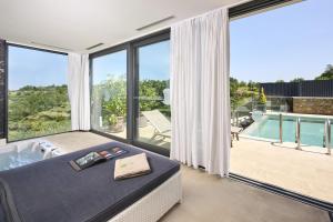 Residence Monte near Umag for 10 people with heated infinity pool, spa & play room