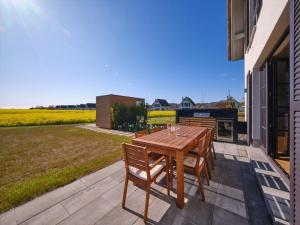 Reetland am Meer - LuxusPlus Reetdachvilla mit 4 Schlafzimmern und Kamin G09