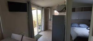 Campings Camping 3 etoiles - Piscine - eeeg00 : photos des chambres