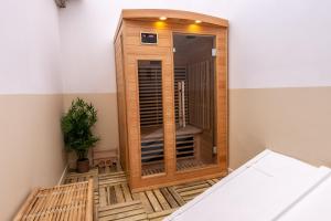 Appartements Le Balinais - Avec Sauna et Balneo : photos des chambres