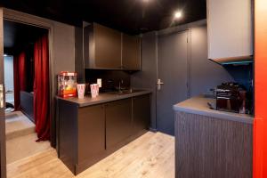 Appartements Le Grand Ecran - Studio Ambiance Cinema : photos des chambres