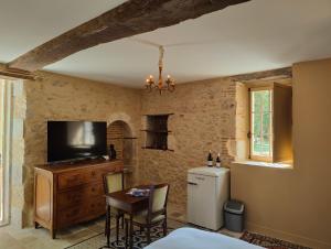 Appartements Les communs du Chateau du Sollier - Charme Calme Confort Climatisation a 5mn du peage : photos des chambres