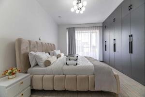 elegant luxury three bedroom apartment with swimming pool fully equipped gym children playing ground ample parking space and a relaxing rooftop with breathtaking scenic views