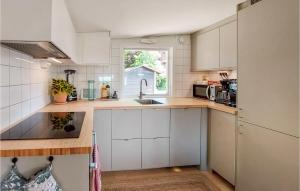 Awesome Home In Harlösa With Lake View