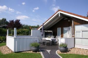 4 Personen Luxusferienhaus mit Sauna, Kaminofen, Klimaanlage, Kanu und Seeblick in Otterndorf - 4hvězdičkové hotely ve městě Otterndorf