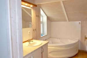 6 Personen kinderfreundliches Ferienhaus mit Sauna, Whirlpool und Kaminofen in Otterndorf