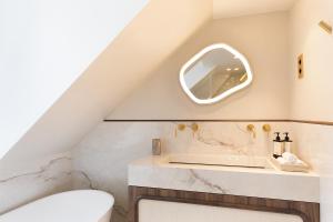 Appartements Maison Galante-s apartments with Services in Louvre - Rue des Dechargeurs : photos des chambres