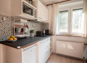 Ferienwohnung im Haus am Hügel