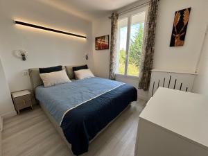 Maisons de vacances Villa avec jacuzzi, sauna&cinema : photos des chambres