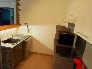 Appartements T3 rez de jardin dans une villa : photos des chambres