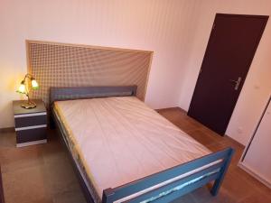Appartements T3 rez de jardin dans une villa : photos des chambres