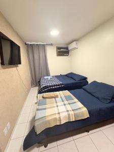 Apê Buritis com ar condicionado para até 6 pessoas