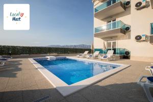 Apartments BlueView - 3hvězdičkové hotely ve městě Postira