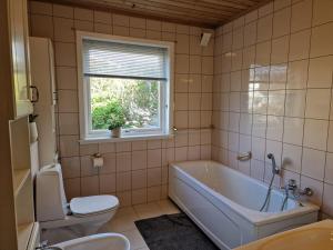 Hus ved Ringshaugstranda