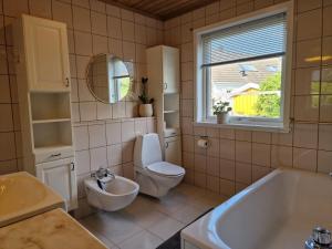 Hus ved Ringshaugstranda