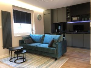 Komfortowy apartament Osiedle Lecha- garaż podziemny, balkon ,wejście 24h kod ,centrum, targi ,faktura