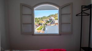 Casa com lareira, Wi-Fi e varanda com vista