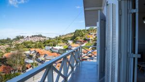 Casa com lareira, Wi-Fi e varanda com vista