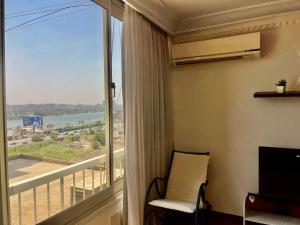 2-Bedrooms Hotel Standard l Direct Nile view - Free WiFi