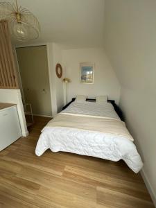 Appartements La roseraie d-Ingrid : photos des chambres