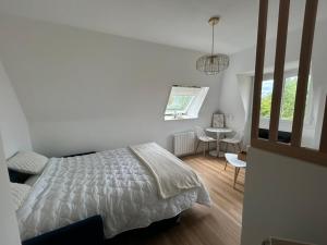 Appartements La roseraie d-Ingrid : photos des chambres