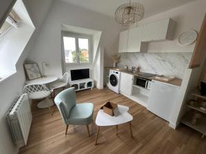 Appartements La roseraie d-Ingrid : photos des chambres