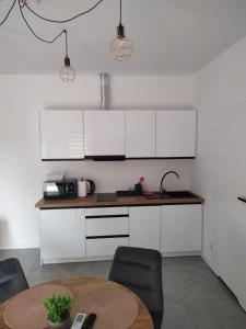 Złote Sady Apartamenty na Mazurach z widokiem na jezioro