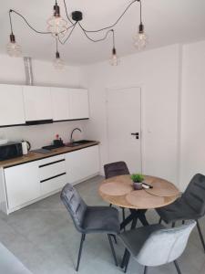 Złote Sady Apartamenty na Mazurach z widokiem na jezioro