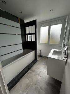 Maisons de vacances La Dragonniere Maison AVEC jardin : photos des chambres