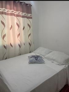 Suites e Quartos Em frente a Praia Grande -Na orla Flavia Alessandra