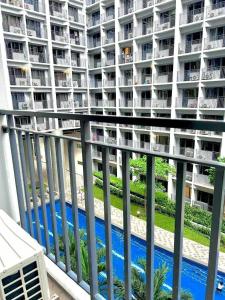 1 Bedroom Condo at Shore 2 Near Airport with Balcony & Pool View
