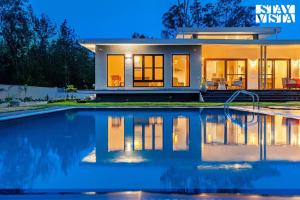 Stayvista at Serenova with big pvt pool and lawn - Your Luxury escape awaits !